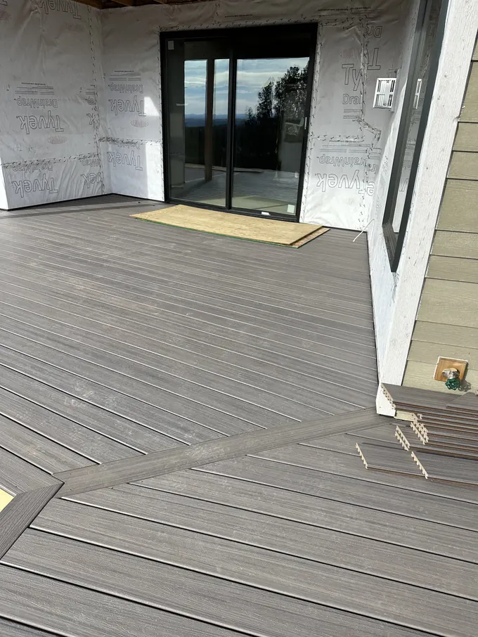 Close-up of dark lap siding corner and trim detail