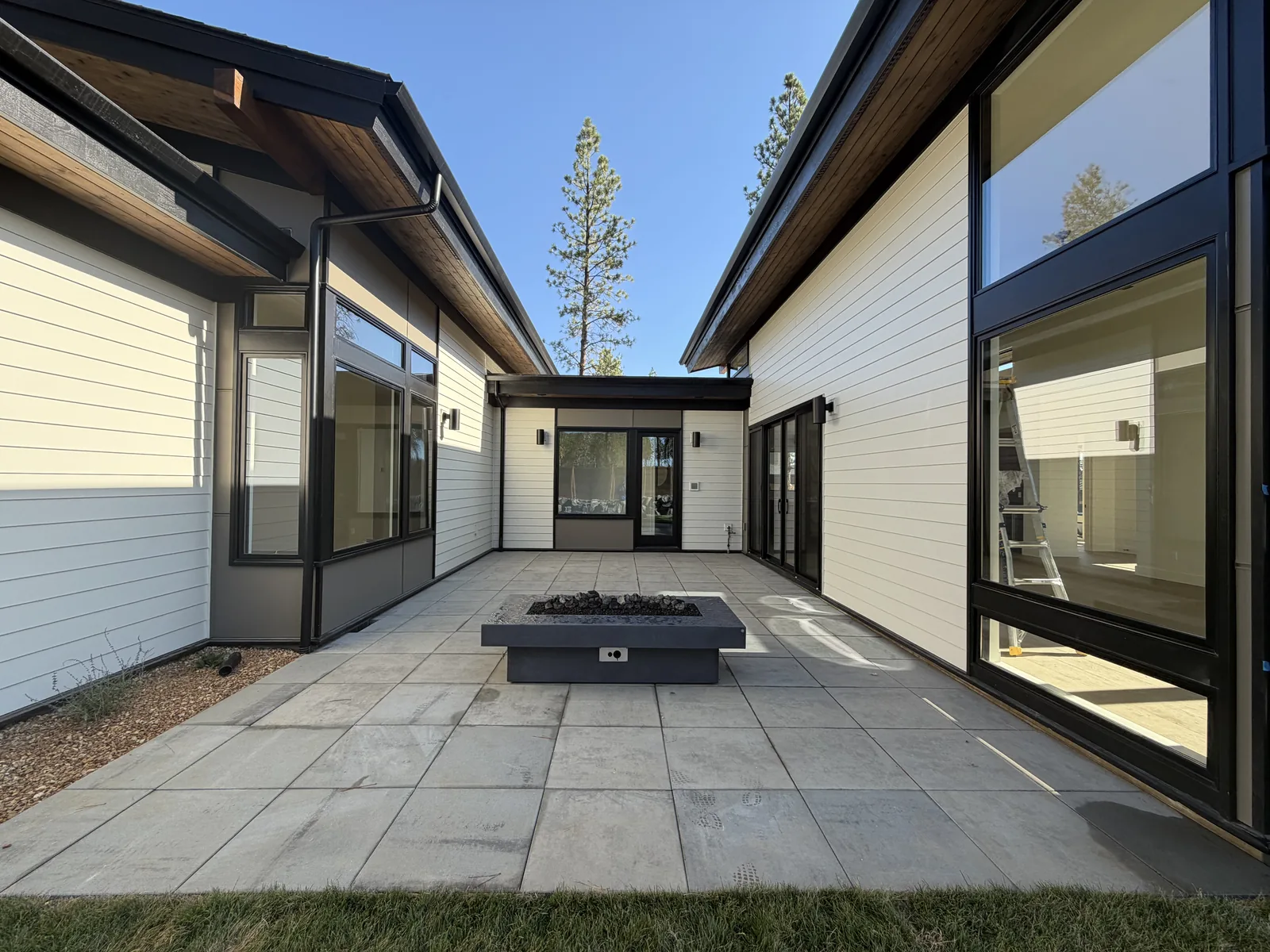 Completed modern home with fire-pit patio built in Central Oregon
